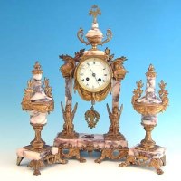 Lot 615 - Pink marble and gilt garniture