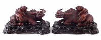 Lot 32 - Pair of Chinese hardwood boy and water buffalo figure groups
