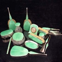 Lot 370 - Silver and enamel dressing table set
