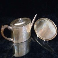 Lot 385 - Silver teapot and stand.