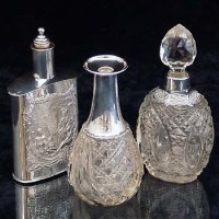 Lot 390 - Silver spirit flask and two silver mounted