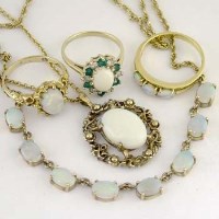 Lot 419 - Opal necklace and three opal rings
