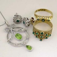 Lot 427 - Emerald and diamond ring; pair diamond / emerald
