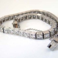 Lot 455 - Platinum and old-cut diamond line bracelet