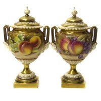Lot 742 - Pair of Royal Worcester lidded vases