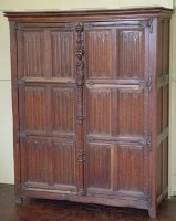 Lot 878 - Heavily carved oak cupboard