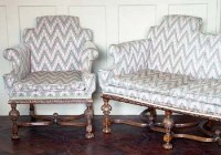 Lot 879 - Jacobean style three piece lounge suite