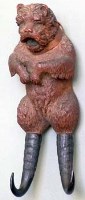 Lot 895 - Bavarian dog coat hook.