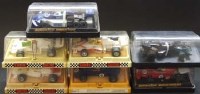 Lot 143 - Seven Scalextric cars in plastic display cases