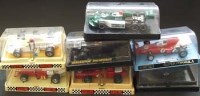 Lot 144 - Seven Scalextric cars in plastic display cases