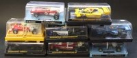 Lot 145 - Eight Scalextric cars in plastic display