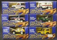 Lot 279 - Six Scalextric STS system 4x4 boxed models