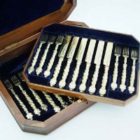 Lot 316 - Half cased set of silver gilt fruit knives and