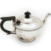 Lot 333 - Silver teapot by Walker and Hall