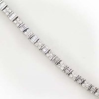 Lot 395 - Baguette and round  diamonds line bracelet