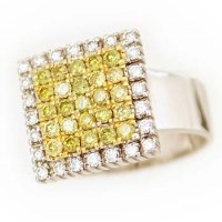 Lot 422 - yellow and white diamond square ring