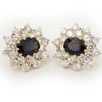 Lot 449 - Pair of 18ct gold sapphire and diamond cluster earrings