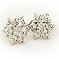 Lot 451 - Pair seven stone diamond earrings