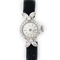Lot 487 - Lady's 18ct white gold and diamond wristwatch