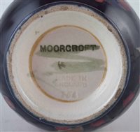 Lot 199 - Moorcroft pomegranate vase.