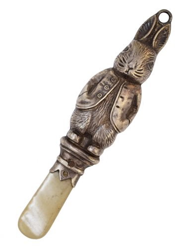 Lot 33 - Silver baby rattle in the form of Peter Rabbit