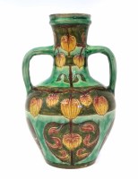 Lot 156 - Della Robbia twin-handled vase