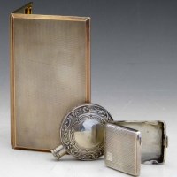 Lot 271 - Silver cigarette case; silver vesta vase; 800