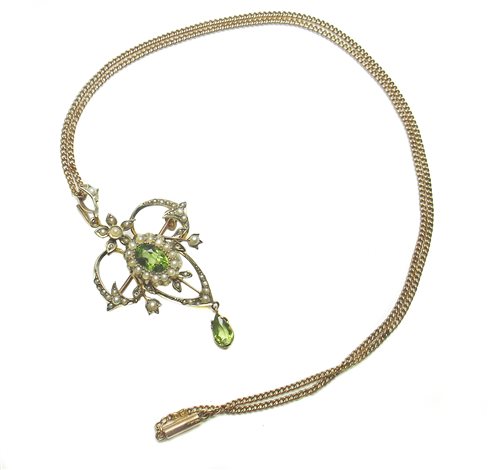 Lot 55 - Edwardian peridot and seed pearl 9ct brooch pendant on chain.