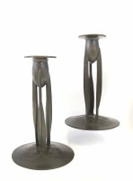 Lot 12 - A pair of Archibald Knox for Tudric pewter candlesticks