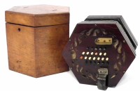Lot 54 - Lachenal concertina with case (48 key).