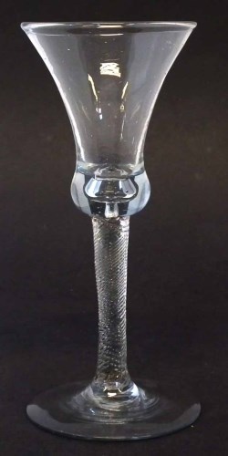 Lot 88 - Wine glass circa 1760, bell shaped bowl, moulded twist stem and plain foot, 18cm high