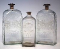 Lot 102 - Two glass flask decanters, with rectangular