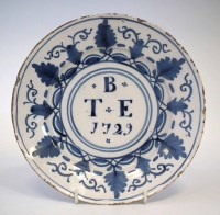 Lot 120 - Delft plate dated 1729, painted in blue with the