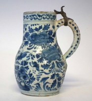 Lot 126 - Delft jug, painted in blue with a peacock
