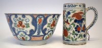 Lot 127 - Delft tankard and a bowl painted in red blue and