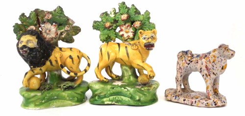 Lot 202 - Pair of Staffordshire pearlware Walton type lions