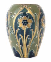 Lot 204 - Macintyre Moorcroft vase, decorated with a green