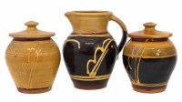 Lot 230 - Clive Bowen (1943-) two slipware lidded pots and a jug