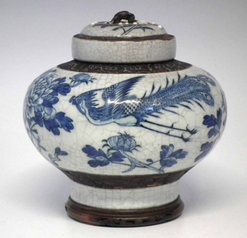 Lot 319 - Chinese Qing Dynasty crackle glaze lidded vase