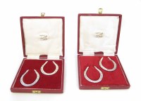 Lot 336 - Two boxed pairs of silver horse shoes