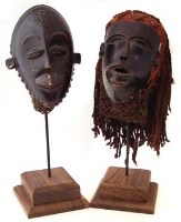 Lot 215 - Two Chokwe masks, the largest measures 28cm high
