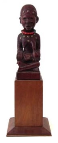 Lot 217 - Yombe maternity figure, 31cm high excluding base.