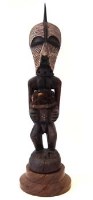 Lot 219 - Songye Nkisi Power figure or Fetish wearing