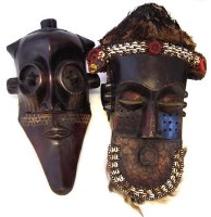 Lot 223 - Two Kuba Kete masks, the largest measures 48cm