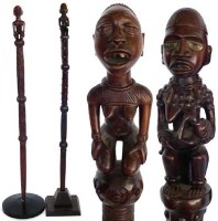 Lot 226 - Two Yombe Chiefs staffs carved with maternity figures, the largest measures 118cm high