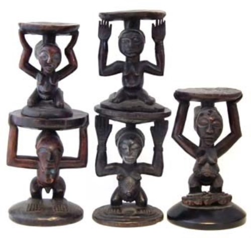 Lot 230 - Five Luba / Hemba and Songye caryatid stools, the