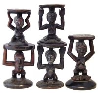 Lot 230 - Five Luba / Hemba and Songye caryatid stools, the
