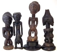 Lot 231 - Four Luba / Hemba figures, the largest measures