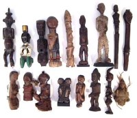 Lot 241 - Seventeen small figures carved in various tribal