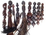Lot 242 - Four fly whisks, four rattles and a wand top